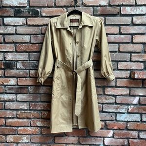 Vintage tan Yves Saint Laurent trench coat.
